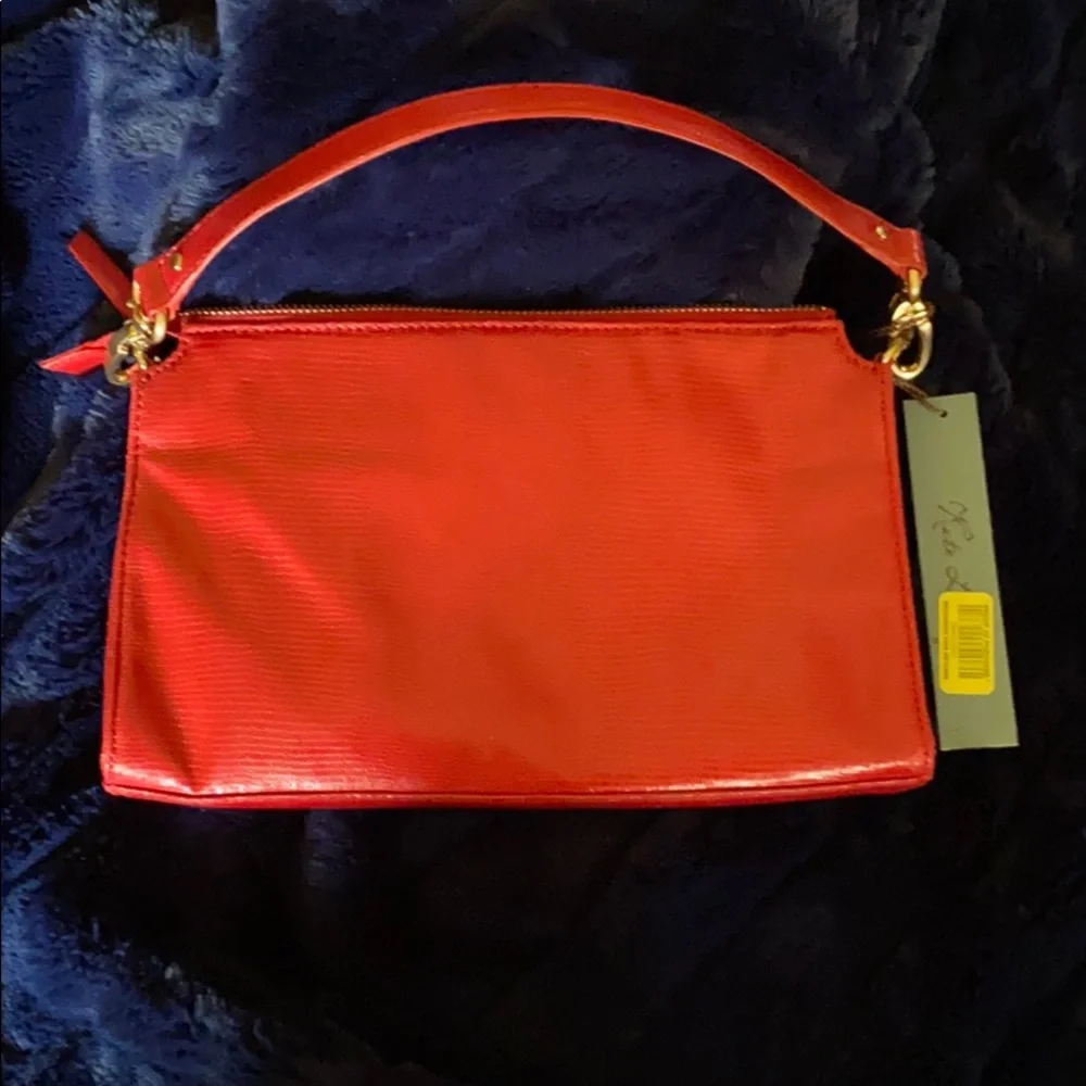 KATE LANDRY. CLUTCH/SMALL PURSE. RED. CLASSY. CUTE